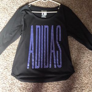 A women’s Adidas long sleeve tee